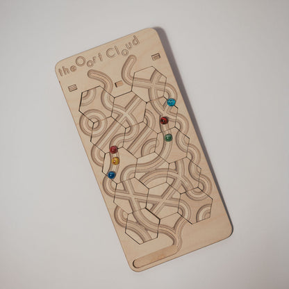 The Oort Cloud: A Marble Run Puzzle Game