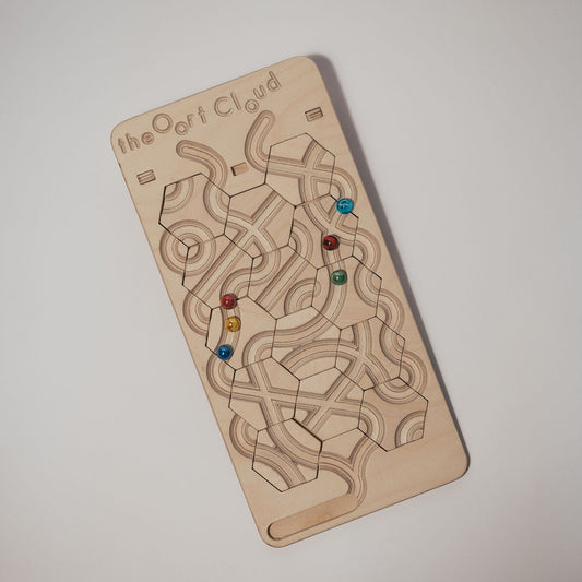 The Oort Cloud: A Marble Run Puzzle Game